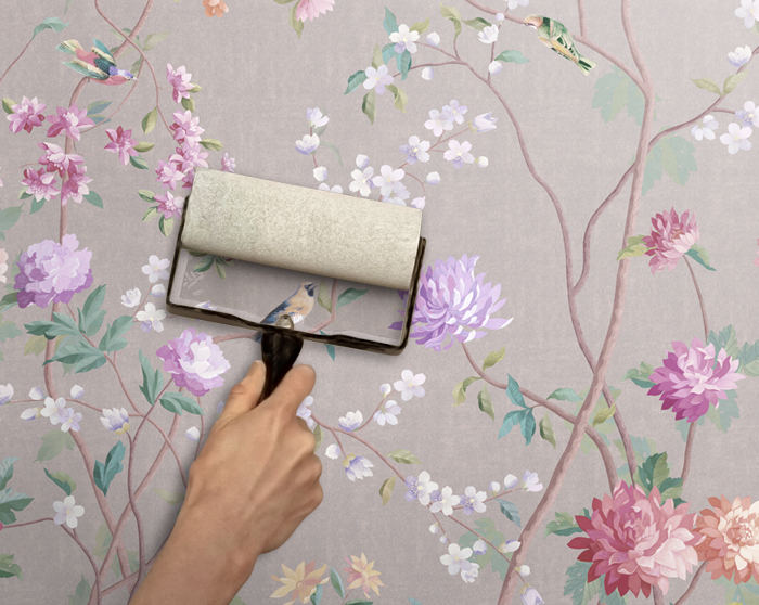3. Carefully push any bubbles and wrinkles out toward the borders with a paint-roller.